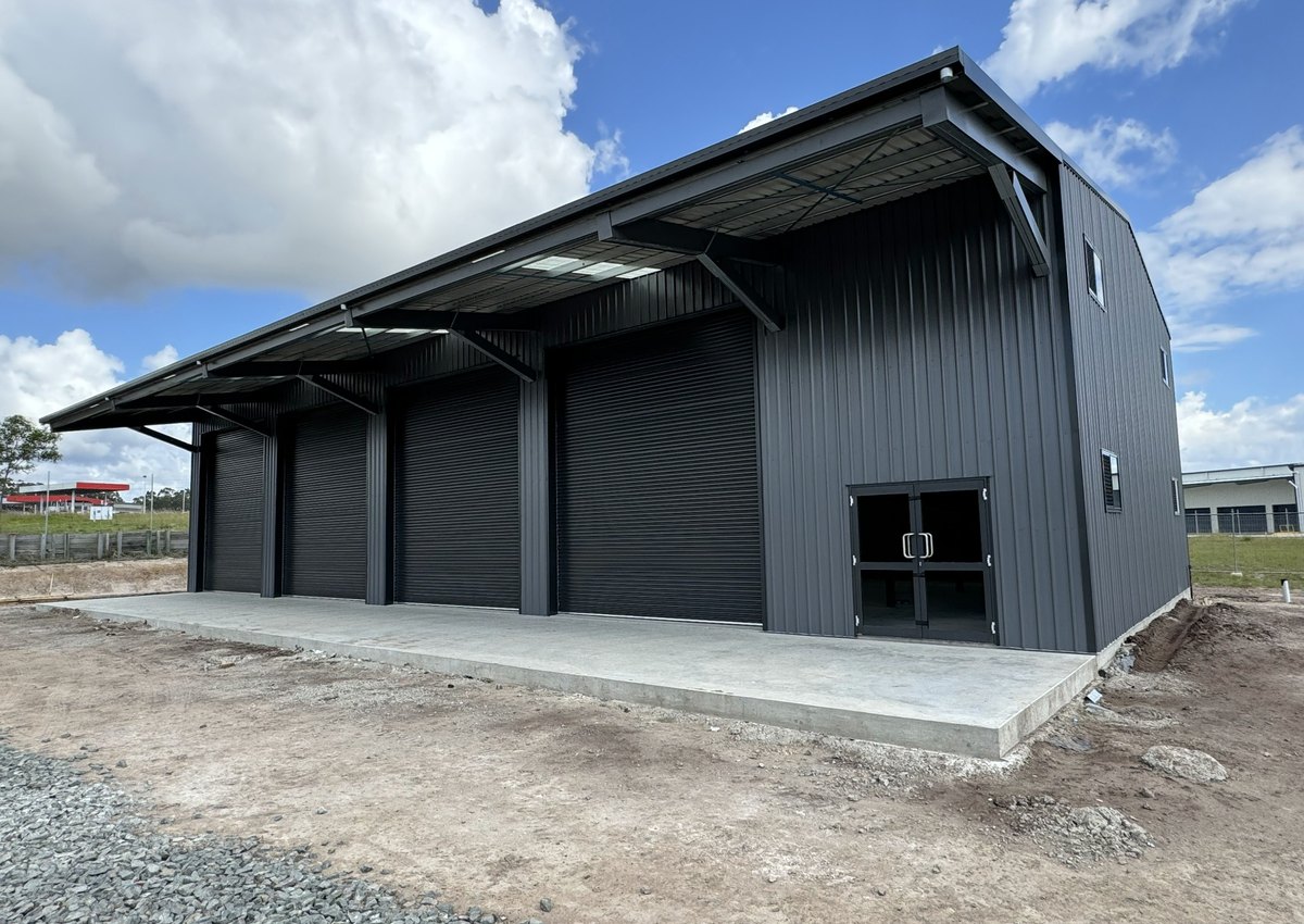 Large commercial and industrial steel building under construction
