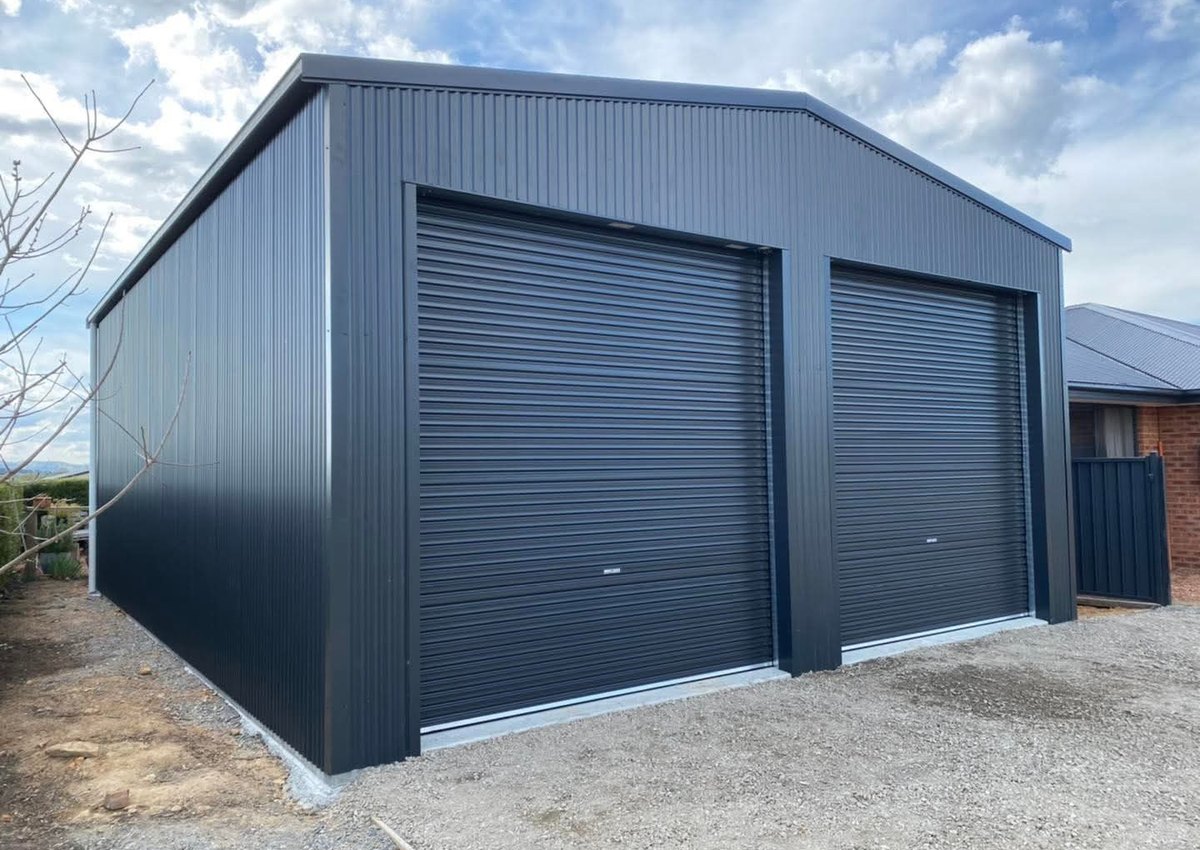 Double garage shed with dark steel cladding